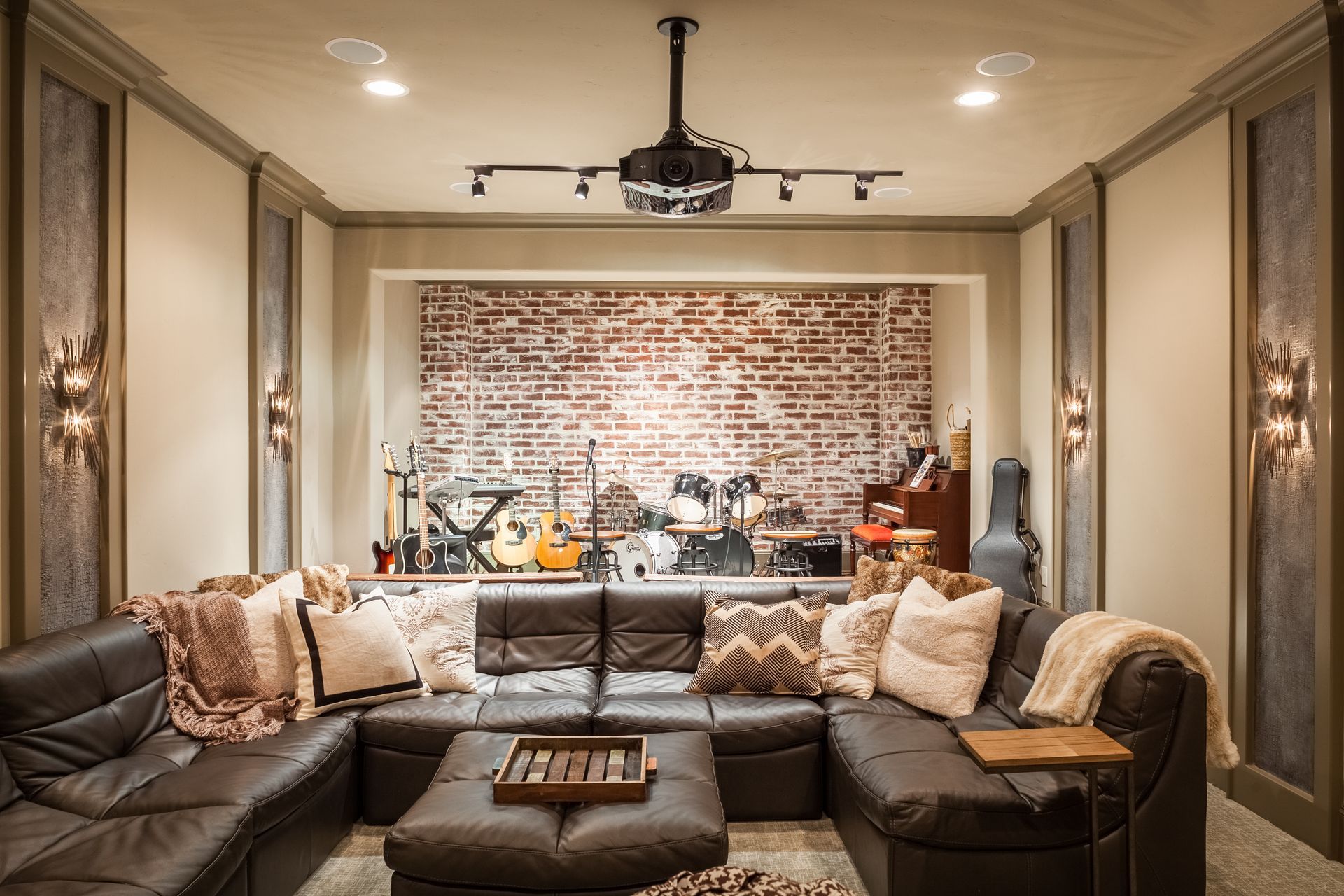 A living room filled with furniture and a projector screen.