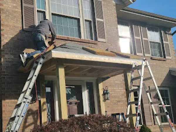 A shingle roof installation in Hamilton, OH - Haubner Construction hard at work