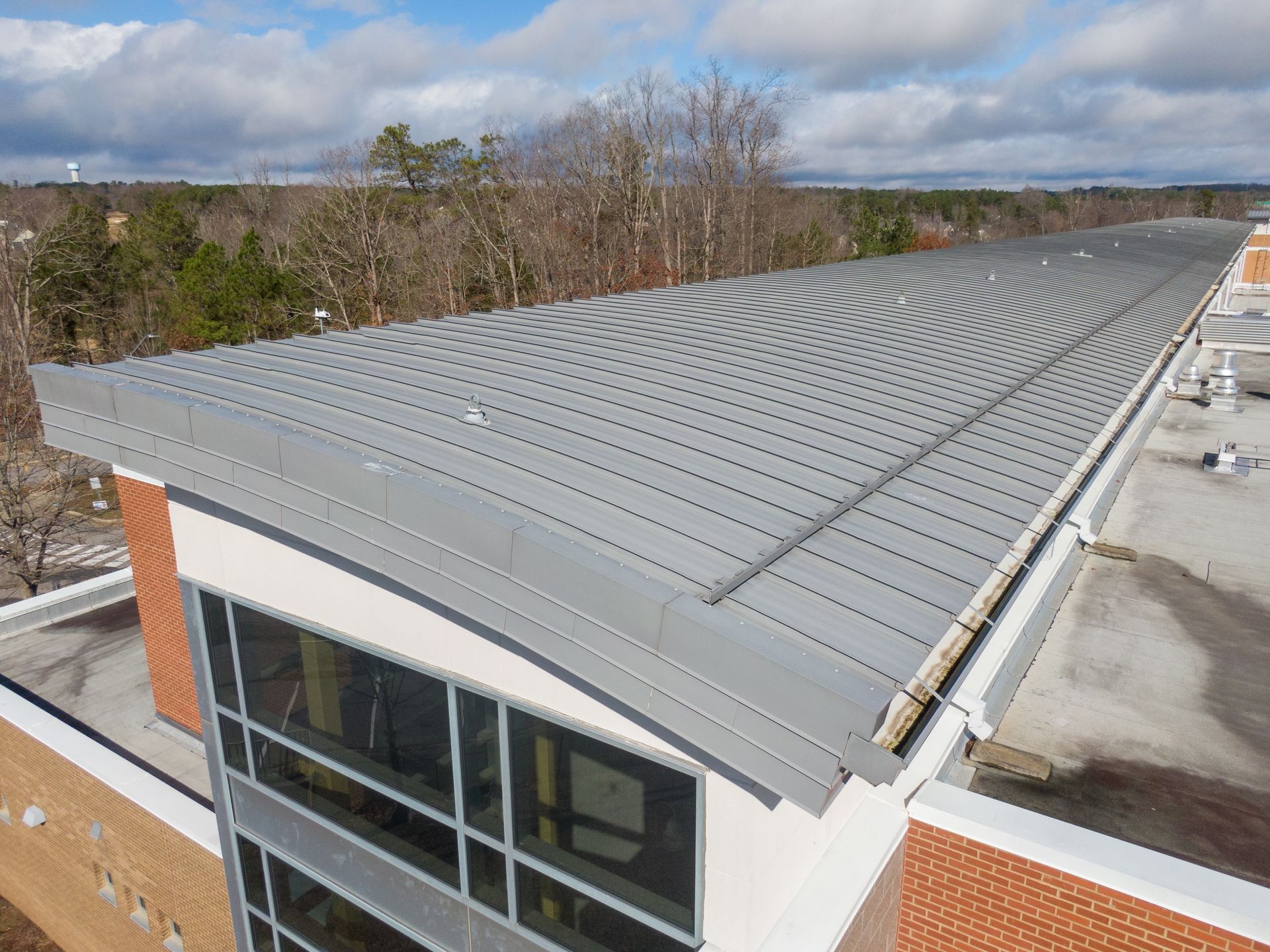 For commercial roof installations in Greater Cincinnati, call Haubner Construction