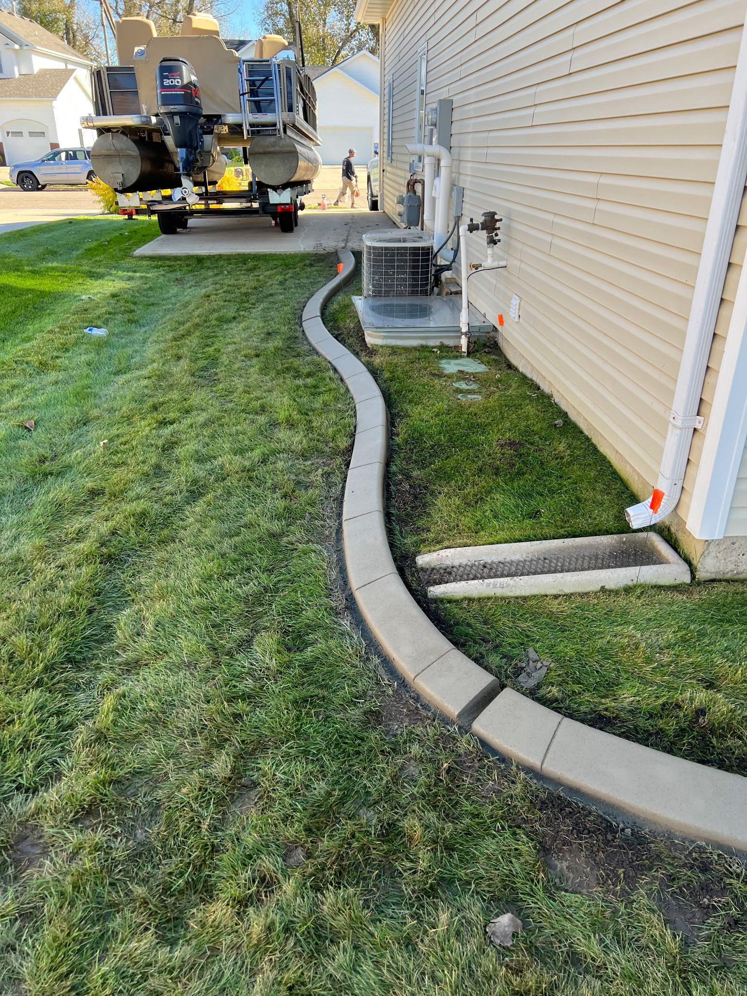 newly installed concrete curbing in Janesville, WI by Rotes Landscaping