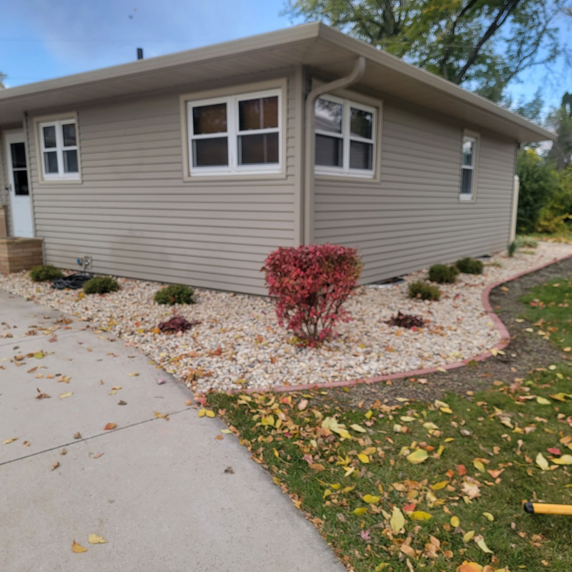 Concrete curbing around new landscape