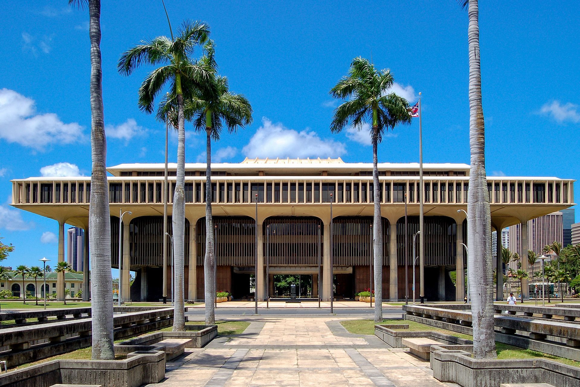 Hawaii State Capitol building with palm trees, Honolulu, Hawaii.