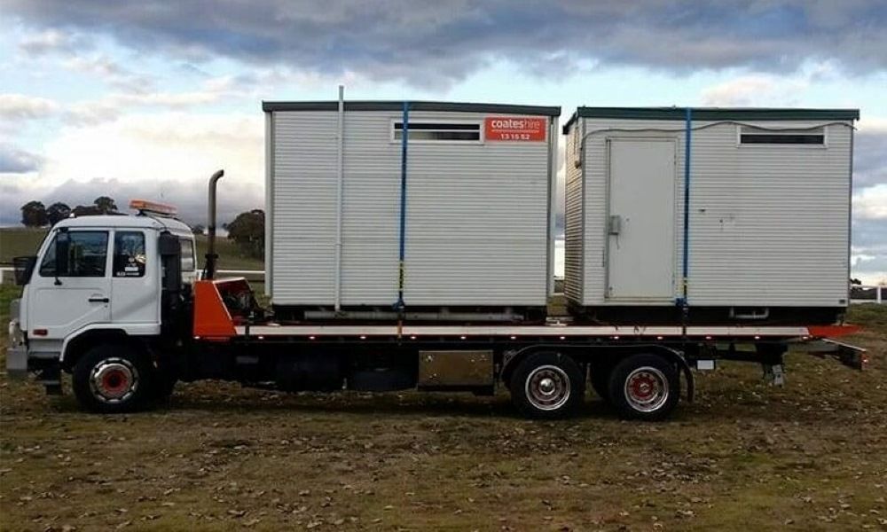 A Truck with Two Containers on The Back of It — Easylift Towing NSW Pty Ltd In Swansea, QLD