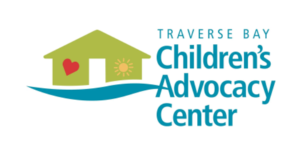 Logo for Traverse Bay Children’s Advocacy Center featuring a green house icon with a red heart and yellow sun.