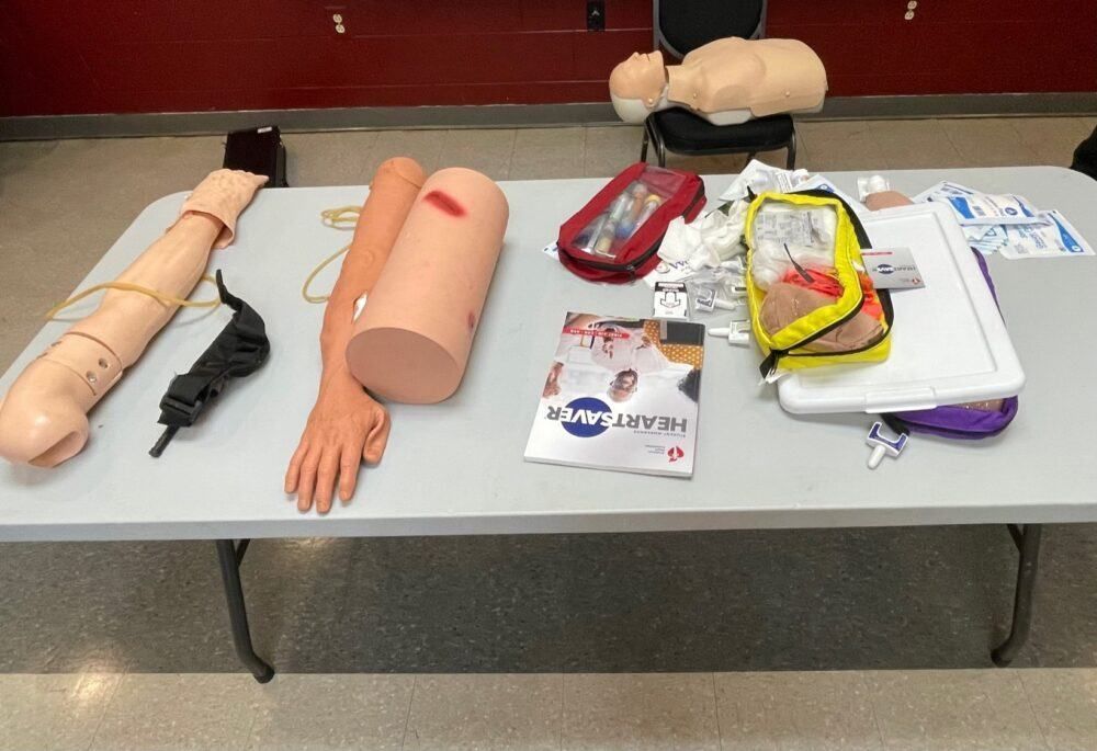 A table with a bunch of medical equipment on it
