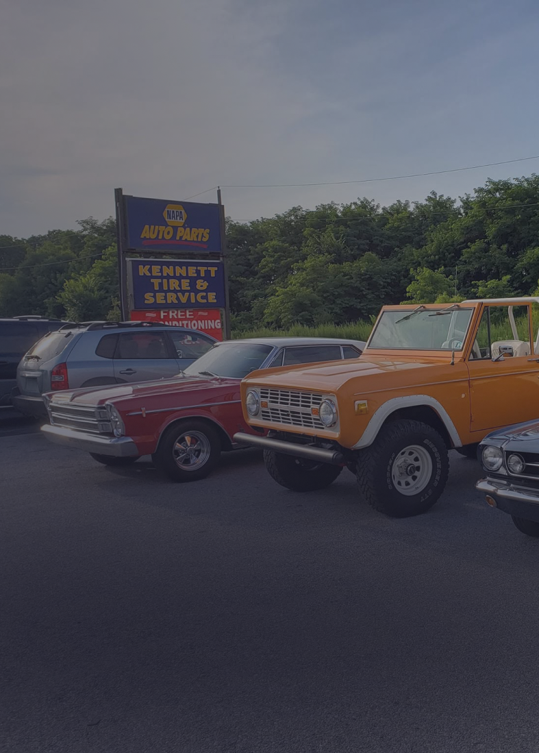 Cars parked in front of the shop | Kennett Tire and Service