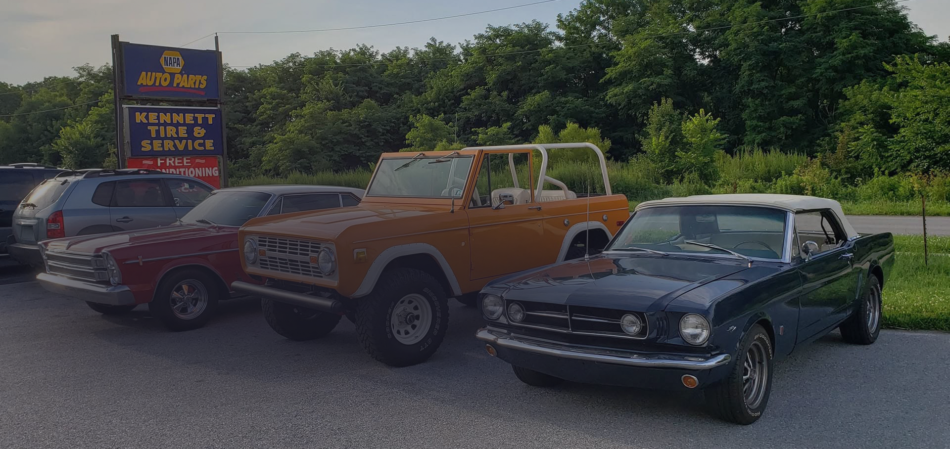 Cars parked in front of the shop | Kennett Tire and Service