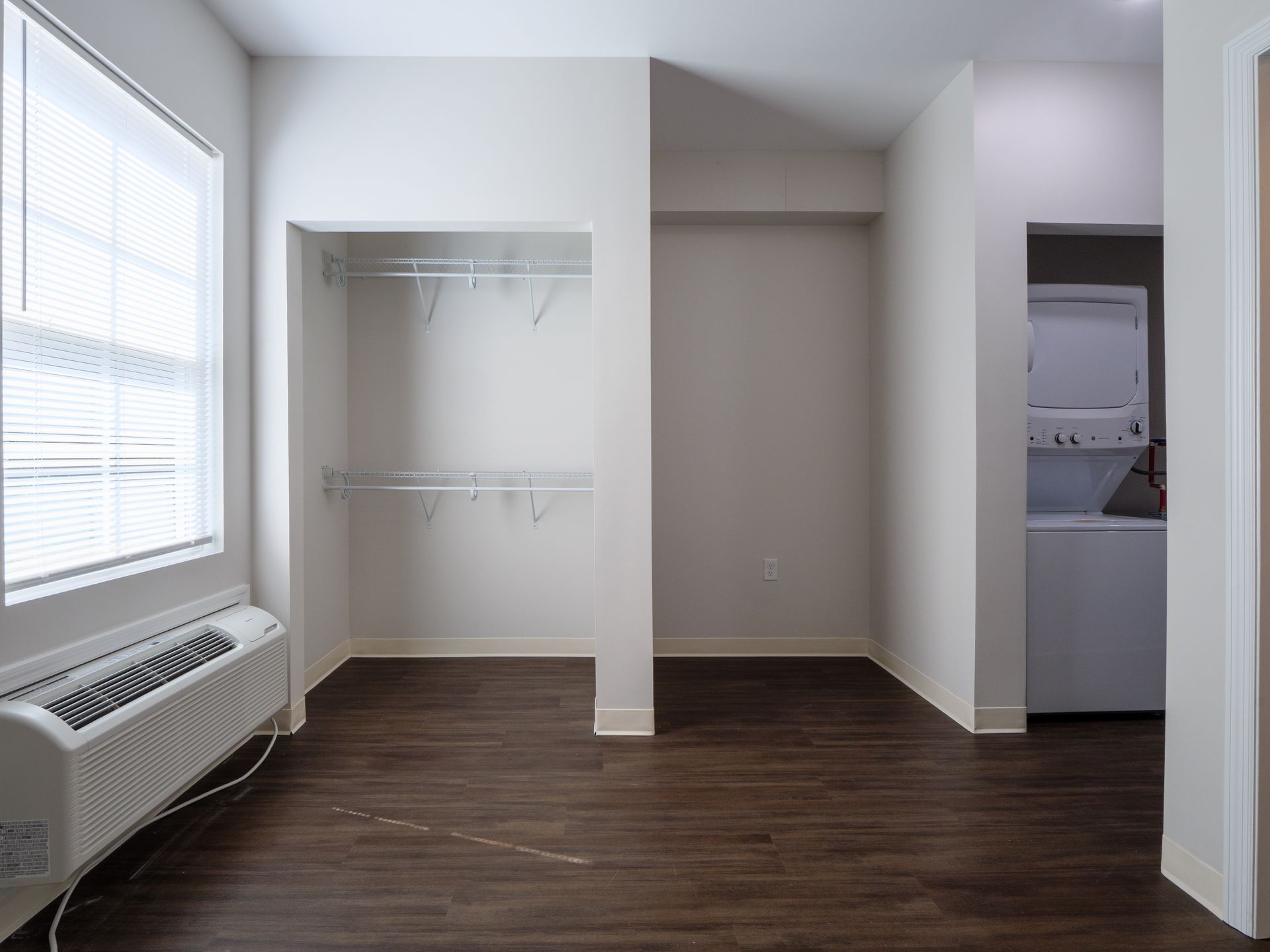 Modern apartment bedroom with LVP flooring