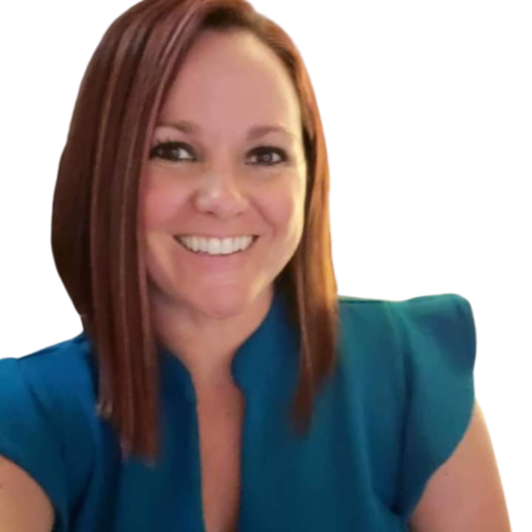 A woman in a blue shirt is smiling for the camera