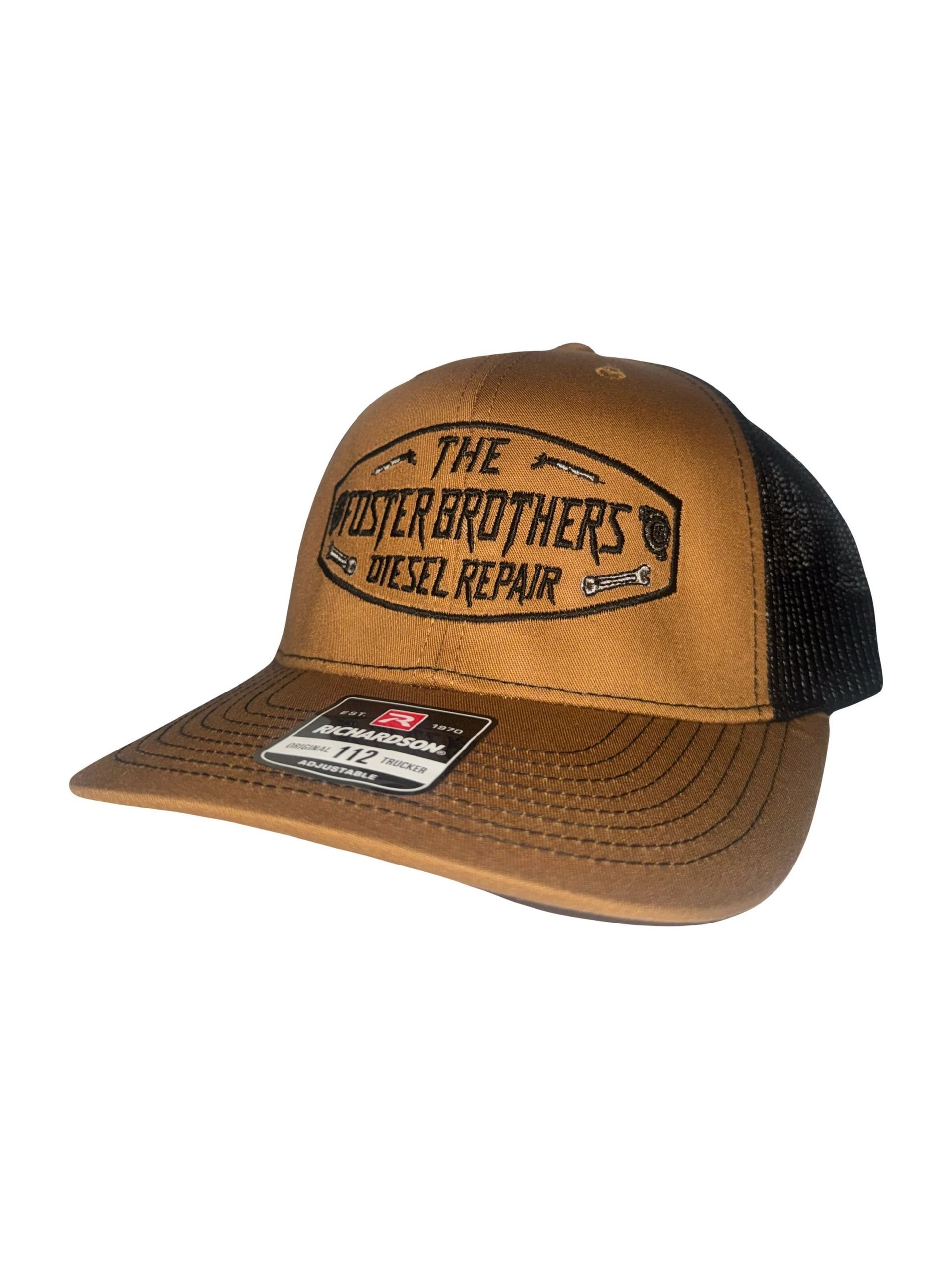 Brown and black trucker hat with "The Schuster Brothers Diesel Repair" logo.