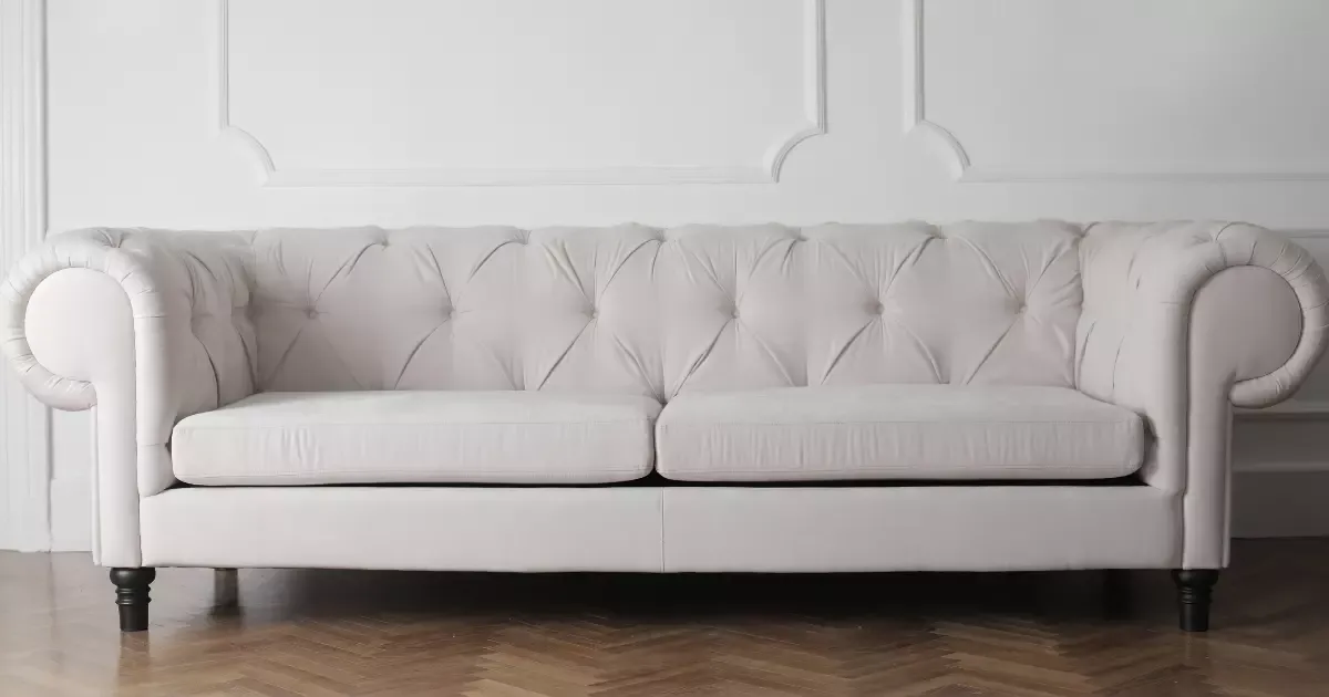 Elegant white sofa in a living room setting, ideal for couch cleaning near me services