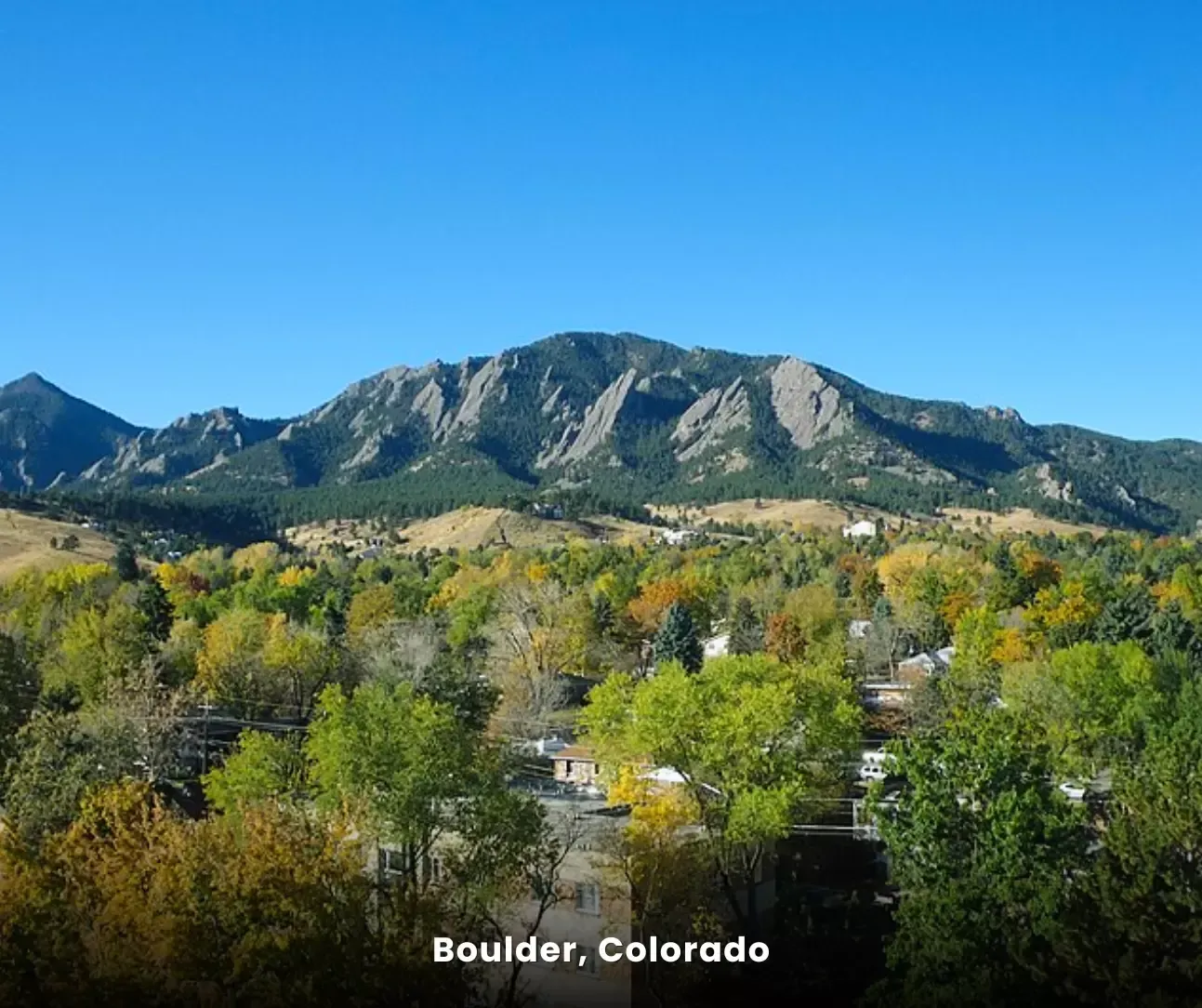 Boulder, Colorado mountain landscape with city below, local area served for upholstery cleaning services