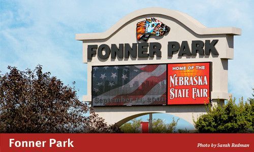 Fonner Park sign with LED display featuring an American flag, Home of the Nebraska State Fair.