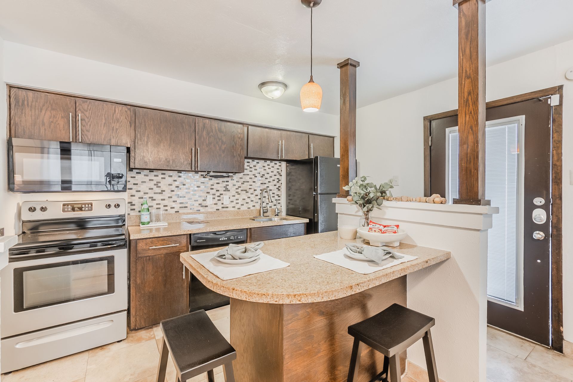Photo of a unique dining area set up like a kitchen island, inside the kitchen