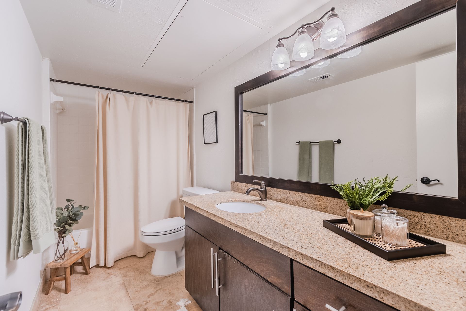 Photo of a bathroom with a very wide counter