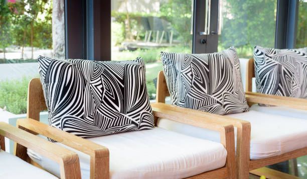 Cushions with vibrant pattern brings interest to this design