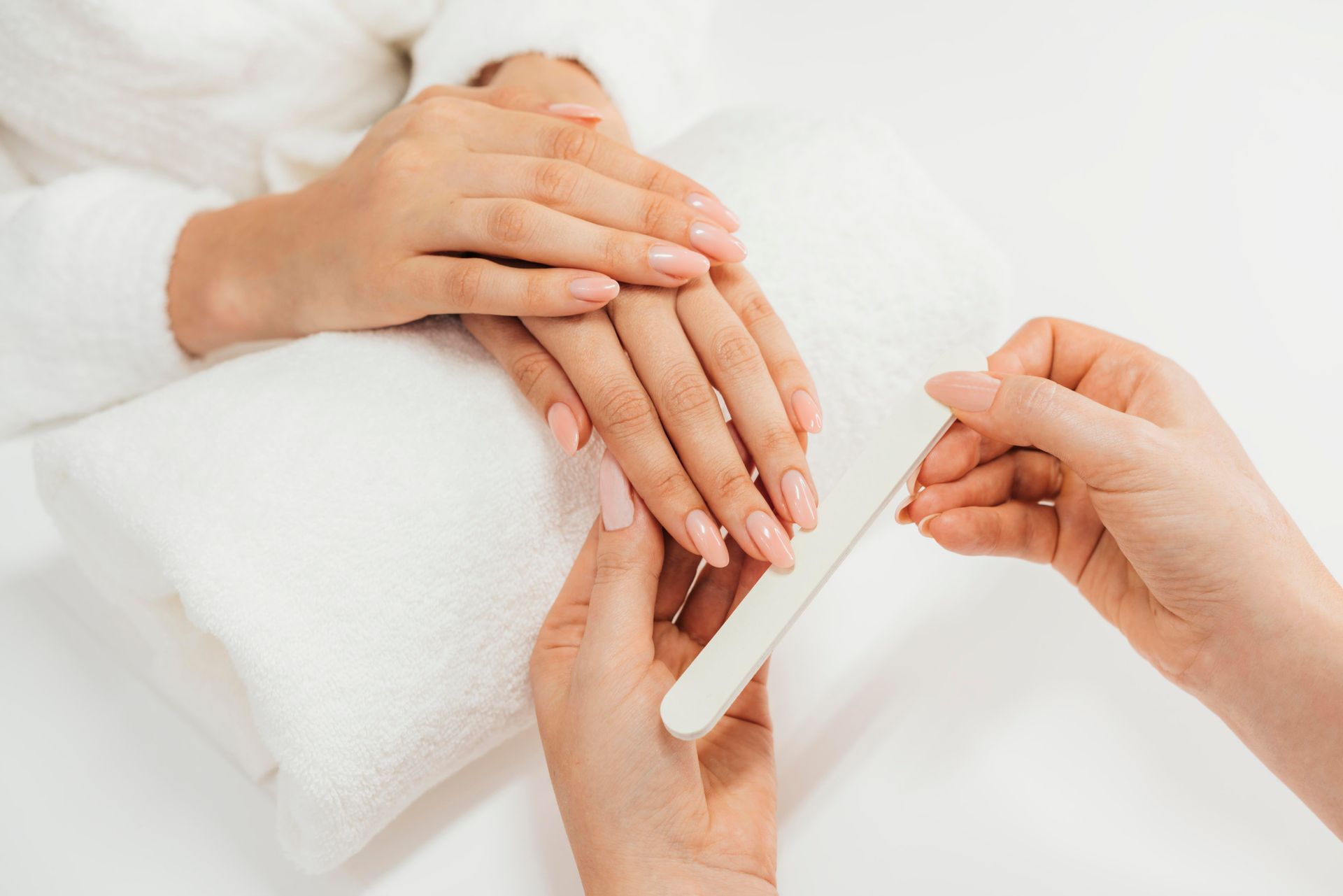 woman getting manicure