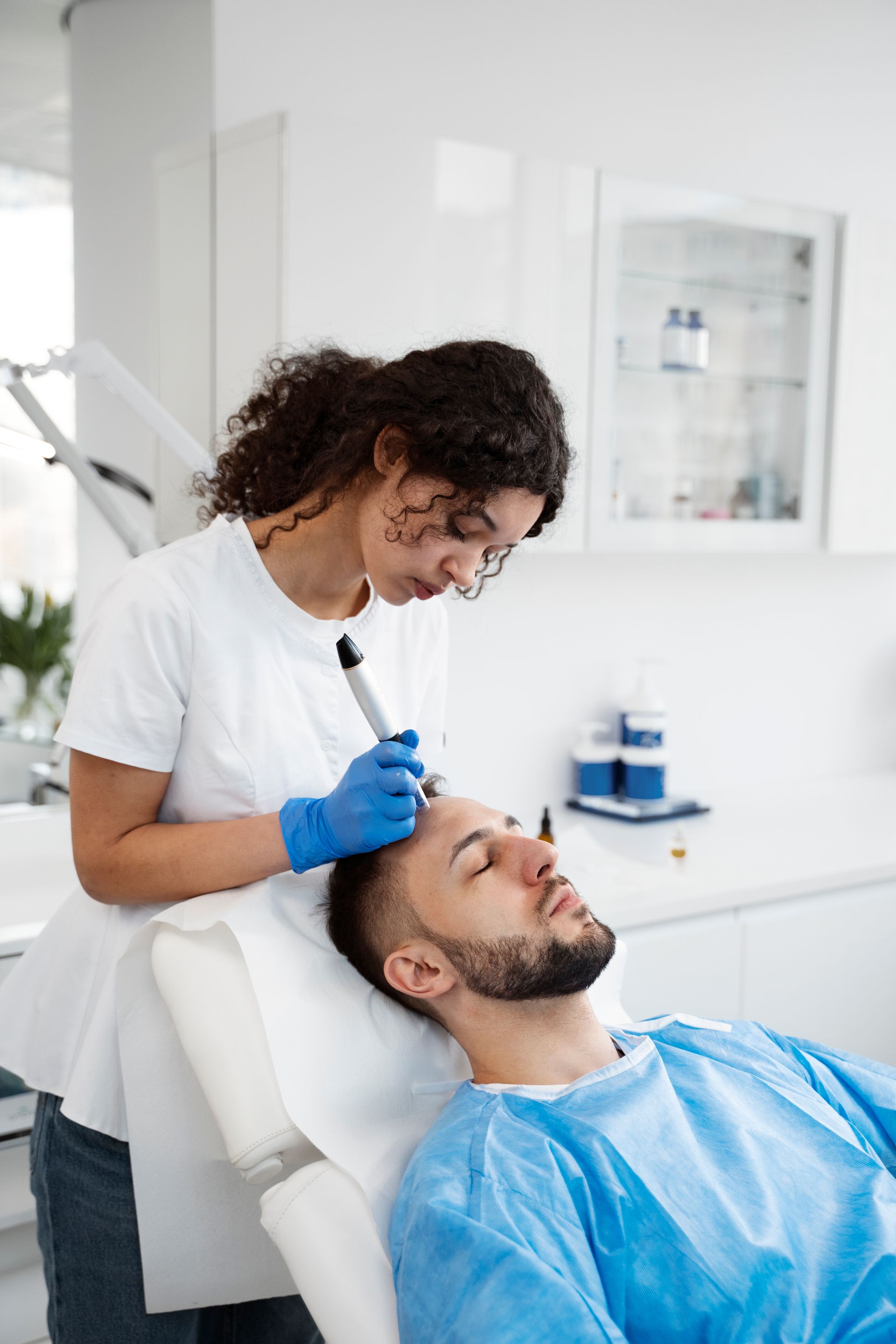 man getting microneedling
