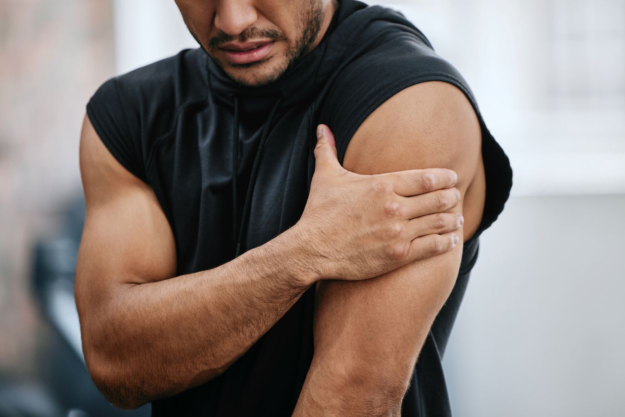 Man with a hurt shoulder