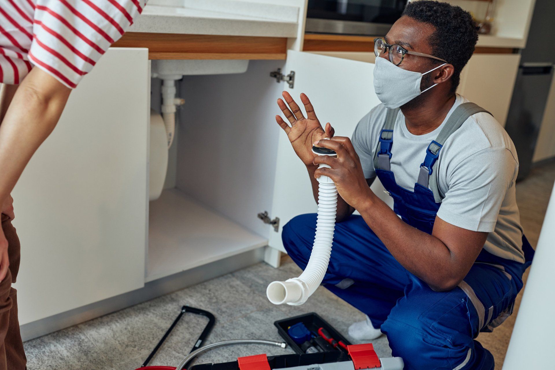 Plumber Helping Client - Abingdon, VA - Complete Plumbing Septic & Drain Solutions Plumber Helping Client - Abingdon, VA - Complete Plumbing Septic & Drain Solutions