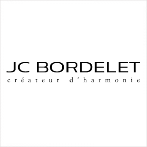 Un logotipo para JC Bordelet sobre un fondo blanco.
