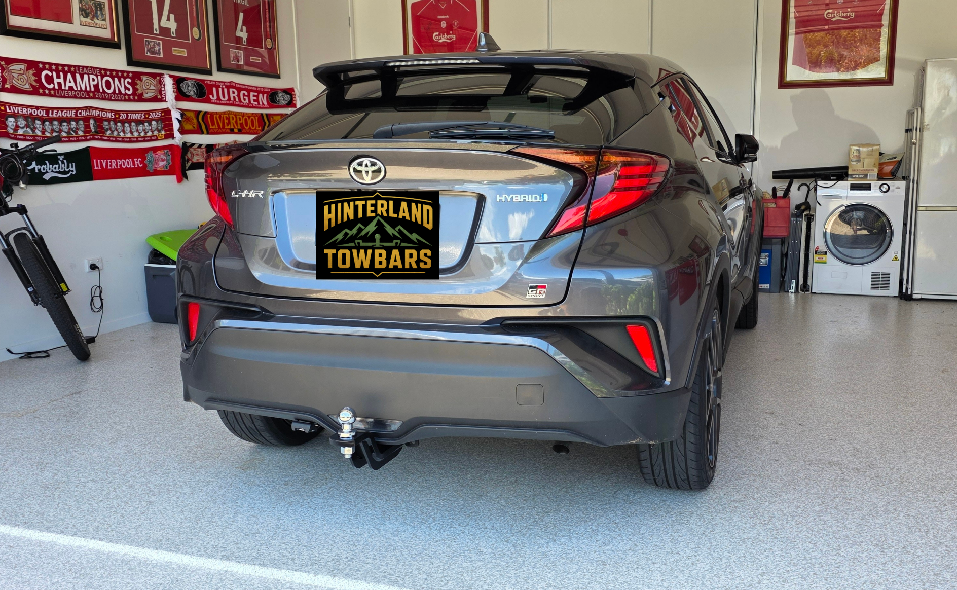 Silver Car With a Trailer Hitch in a Garage — Hinterland Towbars in Southside, QLD
