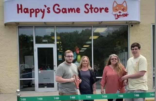 Four people standing outside