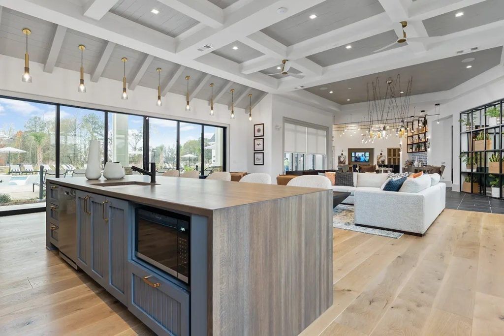 There is a large island in the middle of the kitchen.