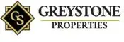 The logo for greystone properties is a black and gold diamond.