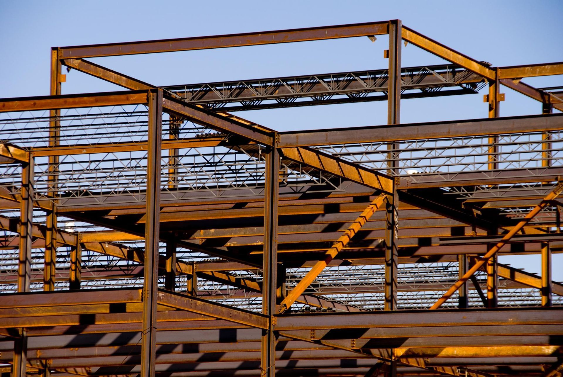 a metal structure with a sky in the background