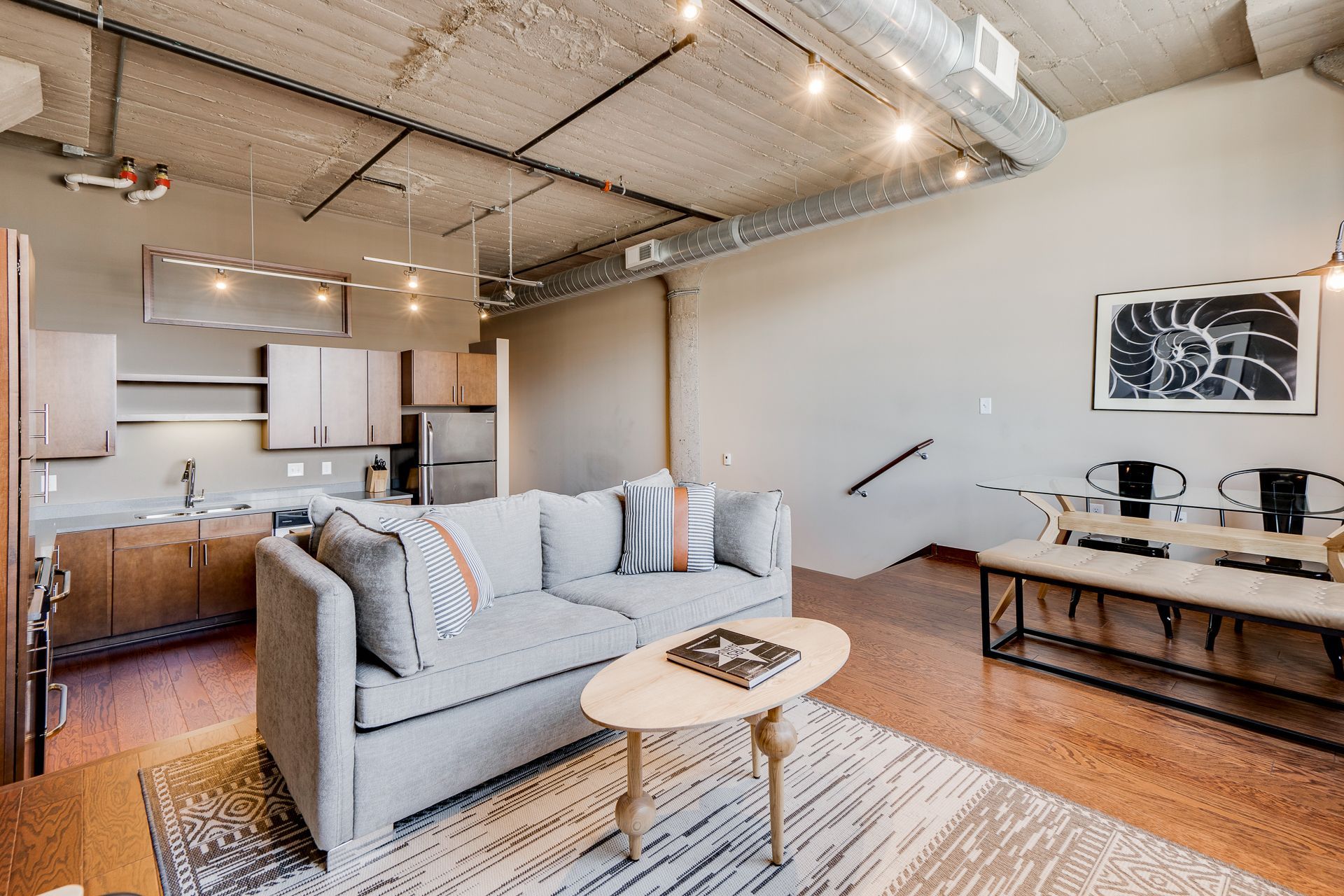 A living room with a couch and a coffee table