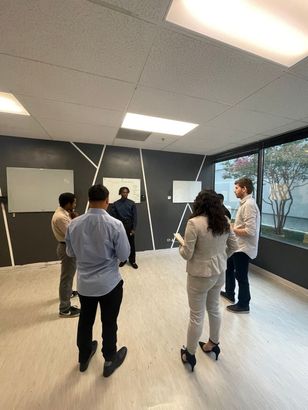 Uptown Connect teammates participating in a small group training session