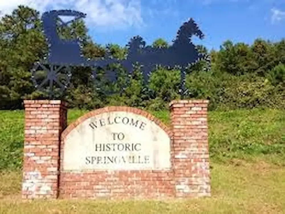 A brick sign reading 