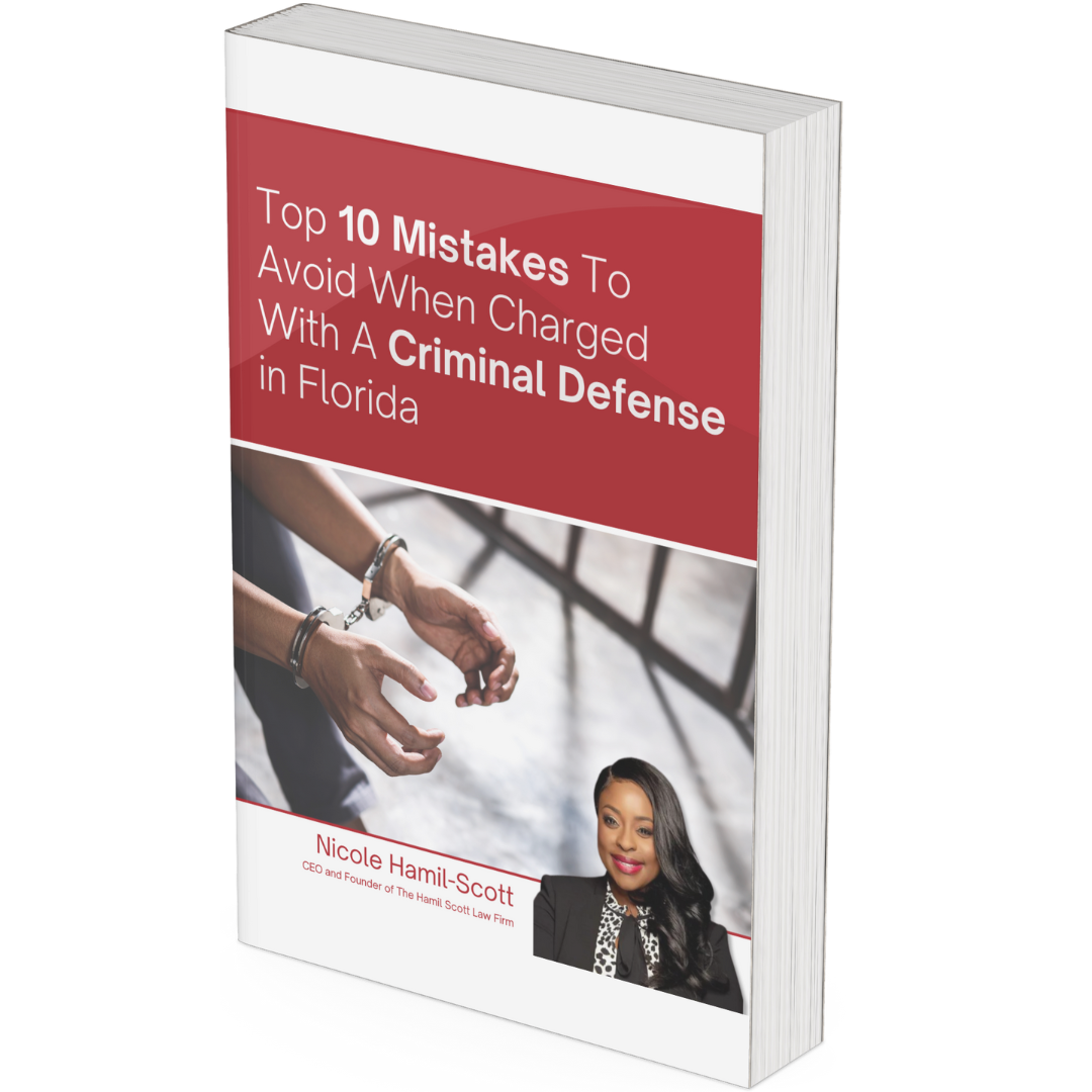 Book cover titled “Top 10 Mistakes to Avoid When Charged With A Criminal Defense in Florida” with handcuffed hands and a portrait.