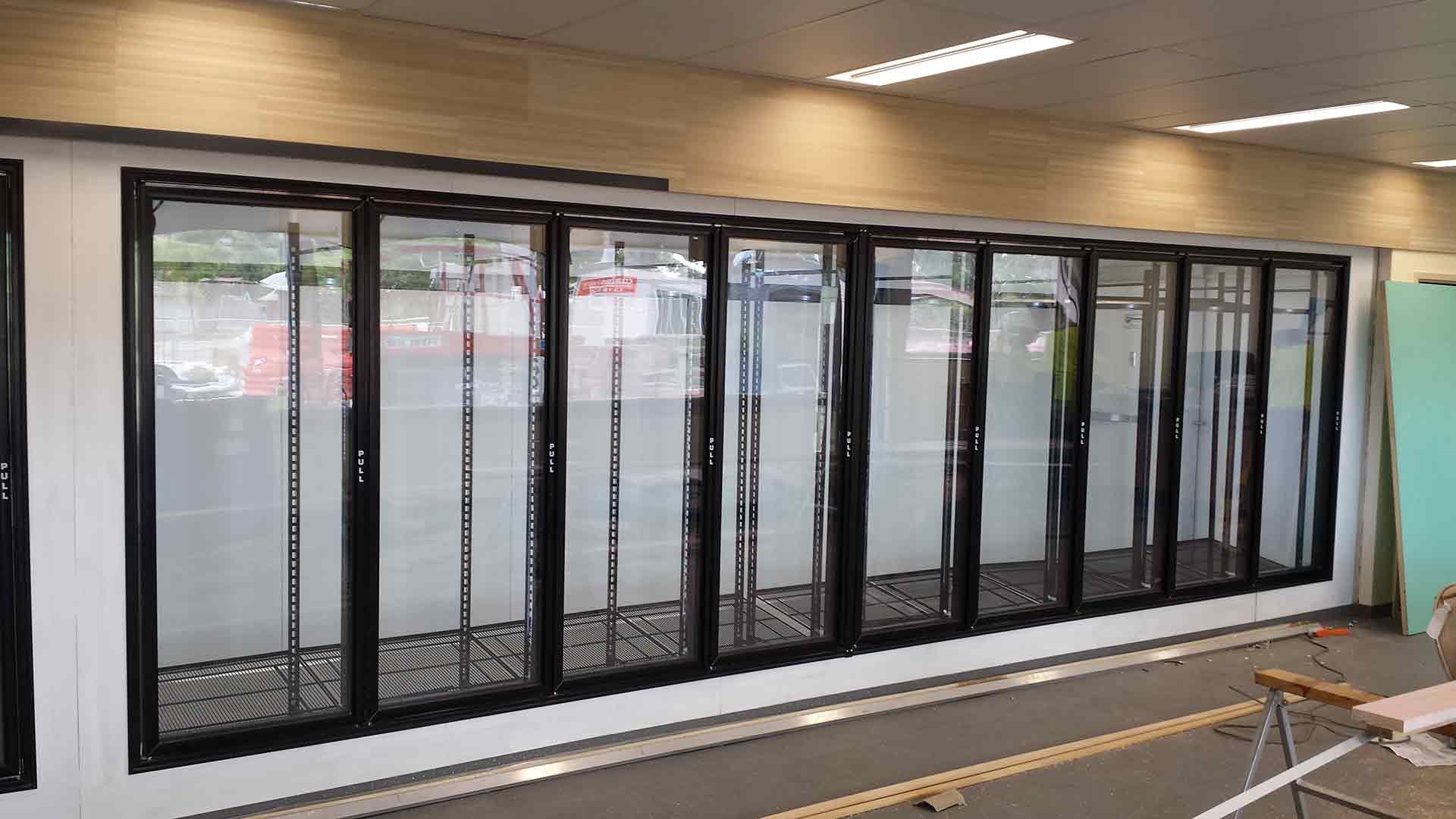A Room With A Lot Of Glass Doors And Windows — Climatech In Noosa, QLD