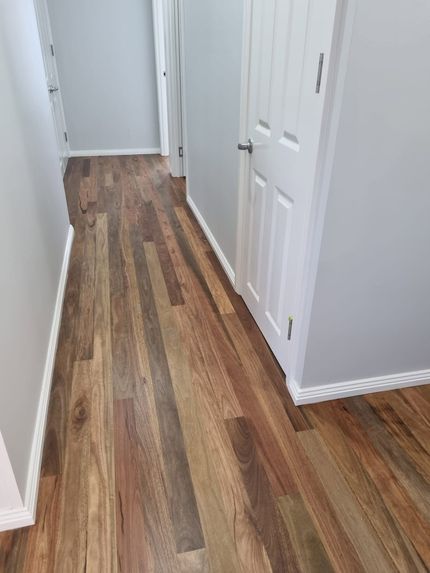 Narrow Hallway With Wood-look Flooring — The Good Wood Polished Timber Floors in Highfields, QLD