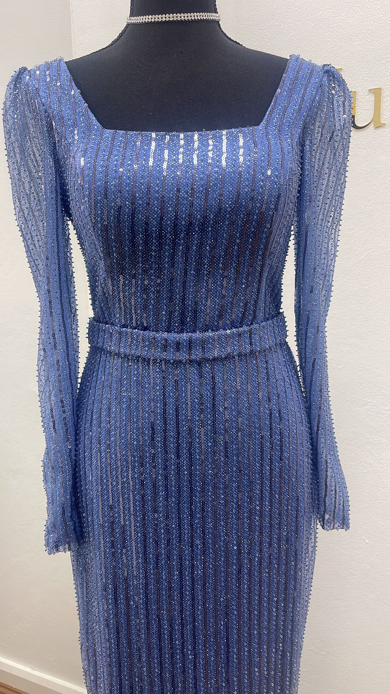 Blue Sequined Long-sleeve Dress on a Black Mannequin — Nur's Collection In Rockdale, NSW