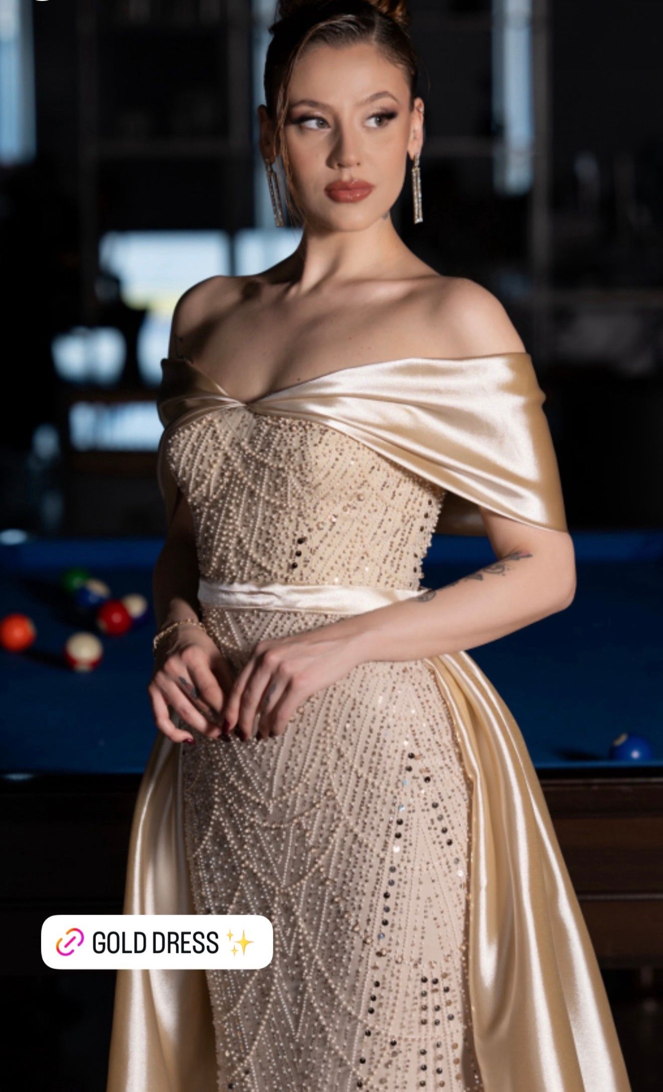 Woman in a Gold Off-shoulder Gown Standing — Nur's Collection In Rockdale, NSW