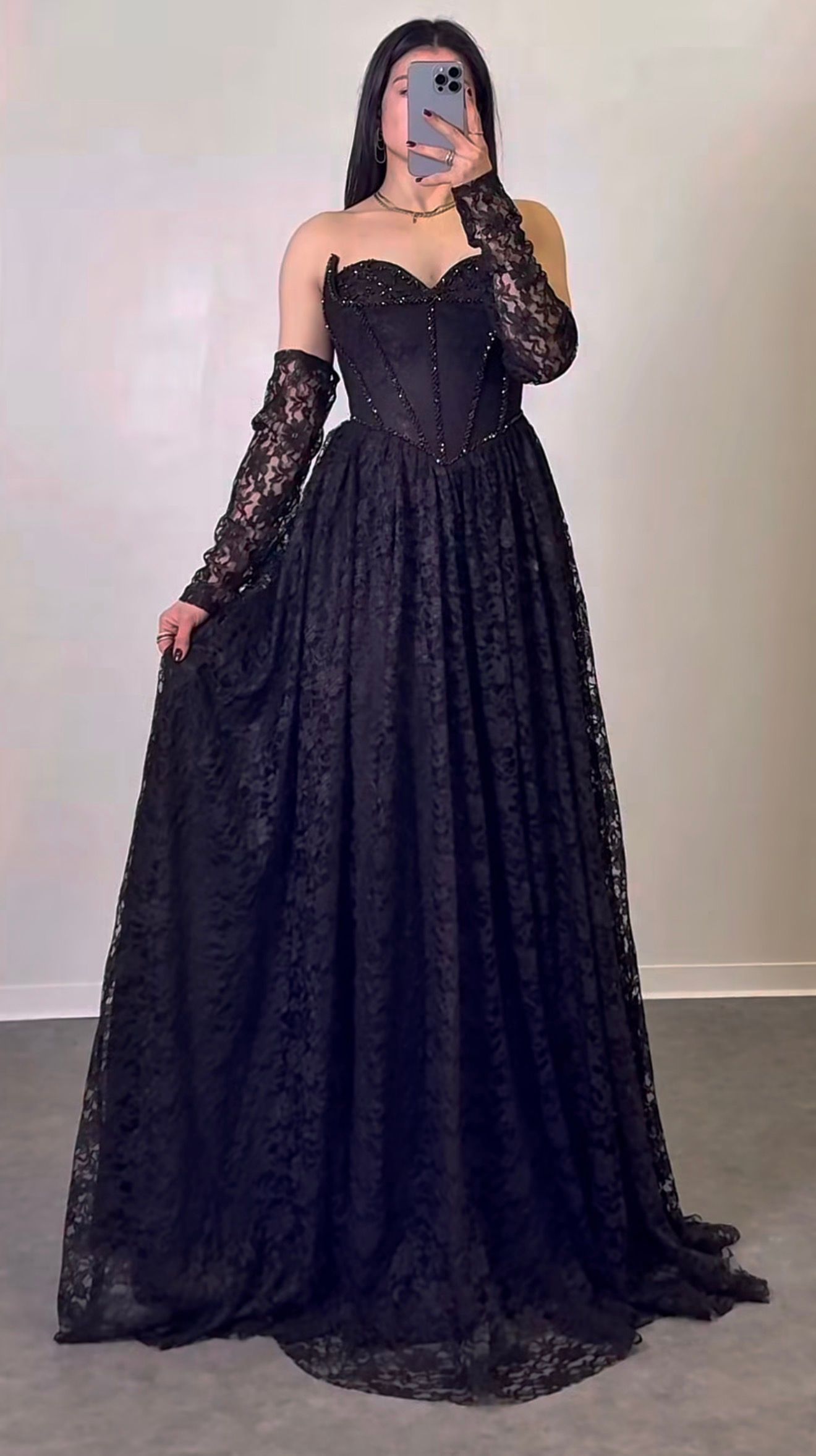 Person in a Black Lace Gown Taking a Mirror Selfie Indoors — Nur's Collection In Rockdale, NSW