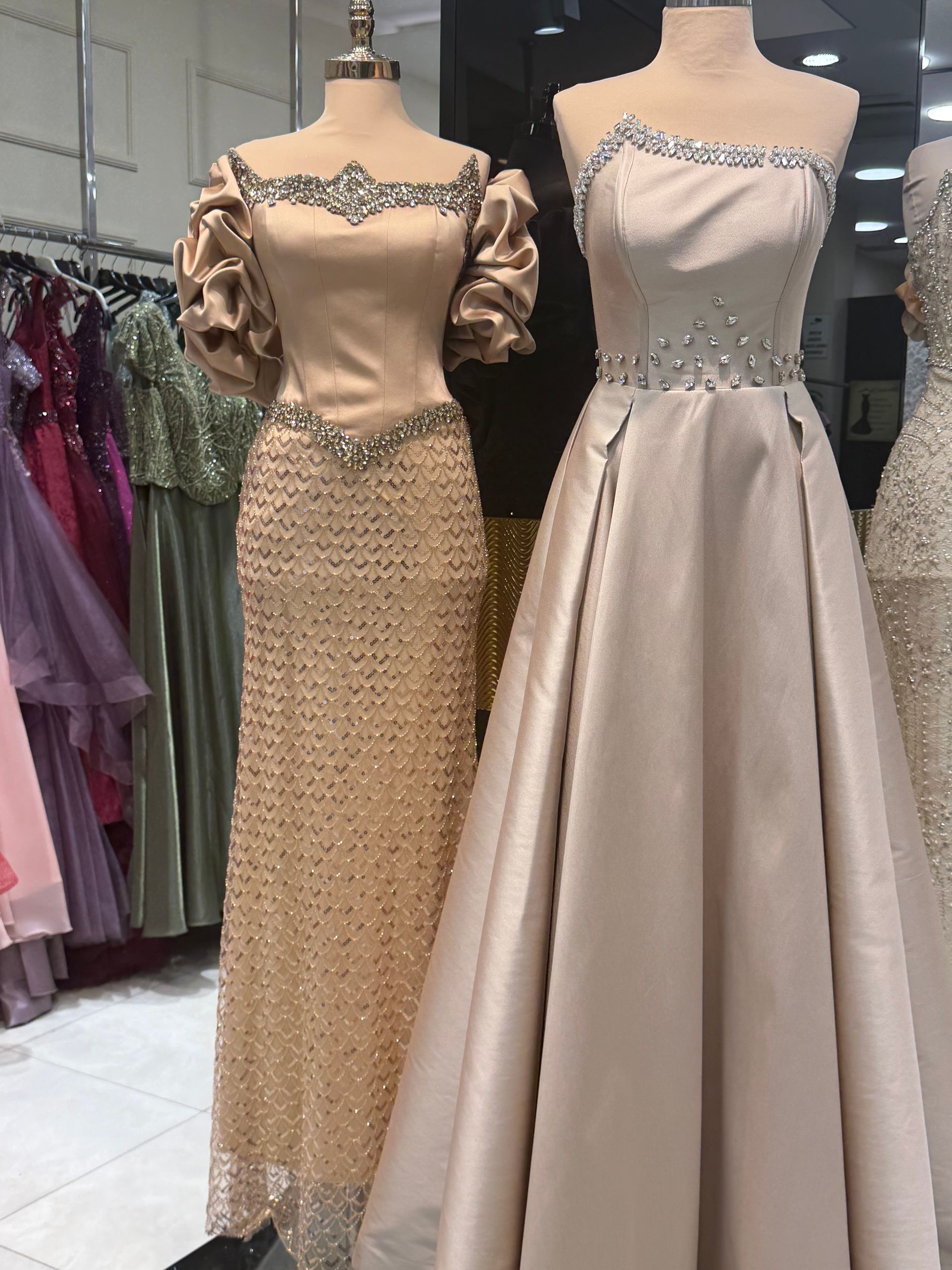 Two Mannequins Display Formal Gowns in a Boutique — Nur's Collection In Rockdale, NSW