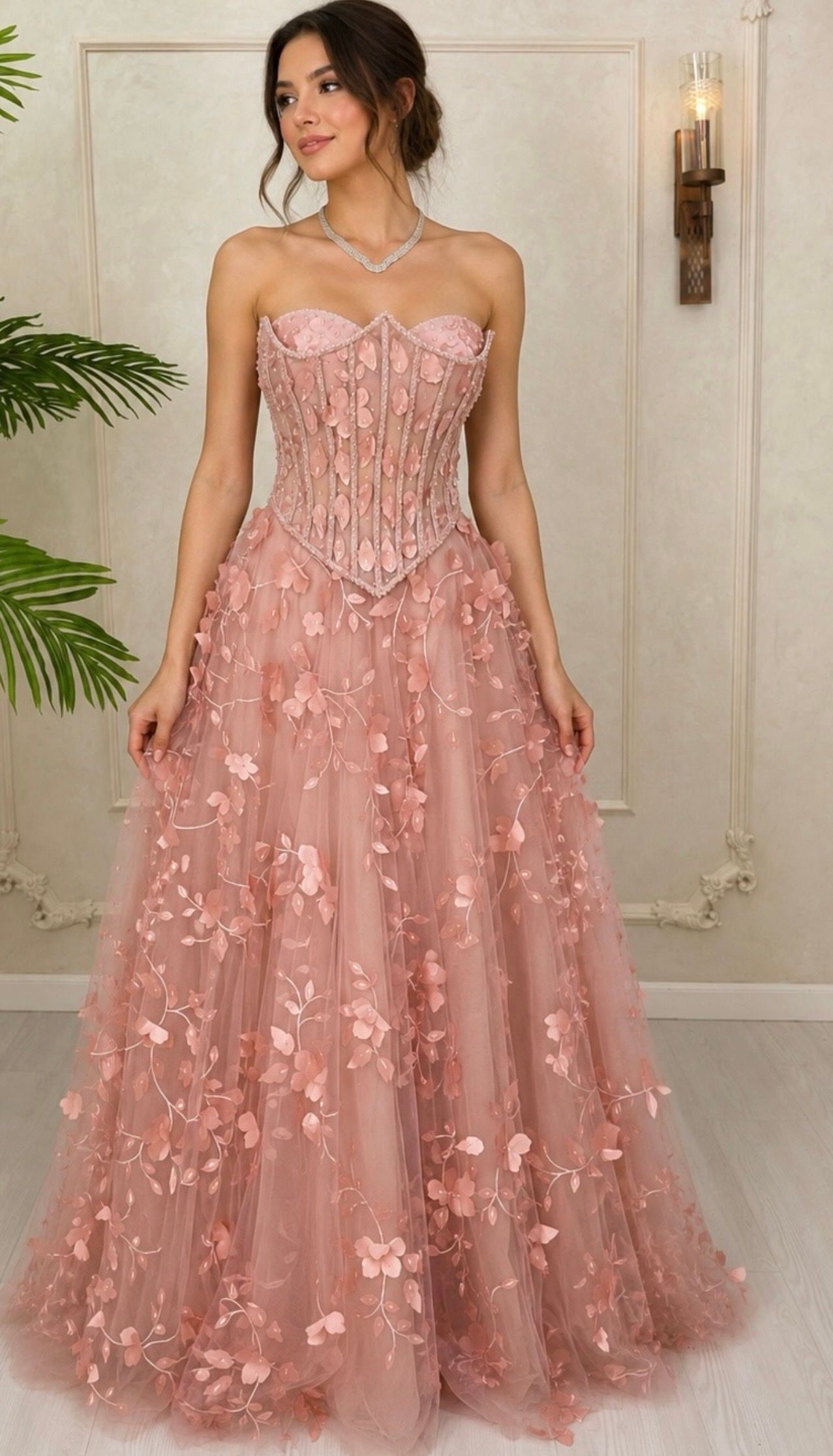 Woman in a Blush Pink Strapless Evening Gown Posing Indoors Against a Cream Wall — Nur's Collection In Rockdale, NSW