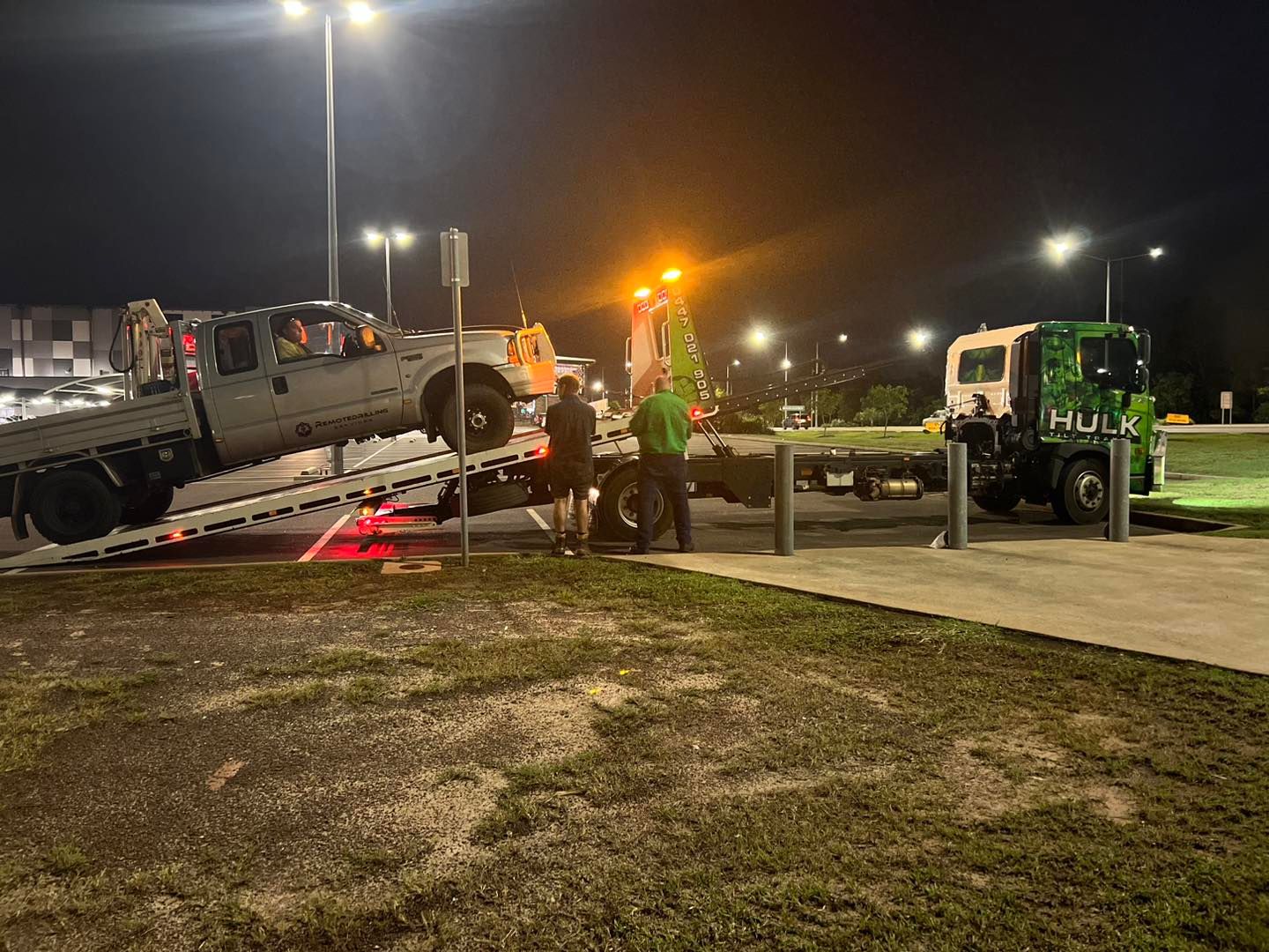 A Tow Truck Carrying a Ute — Hulk Tilt Trays In Humpty Doo, NT
