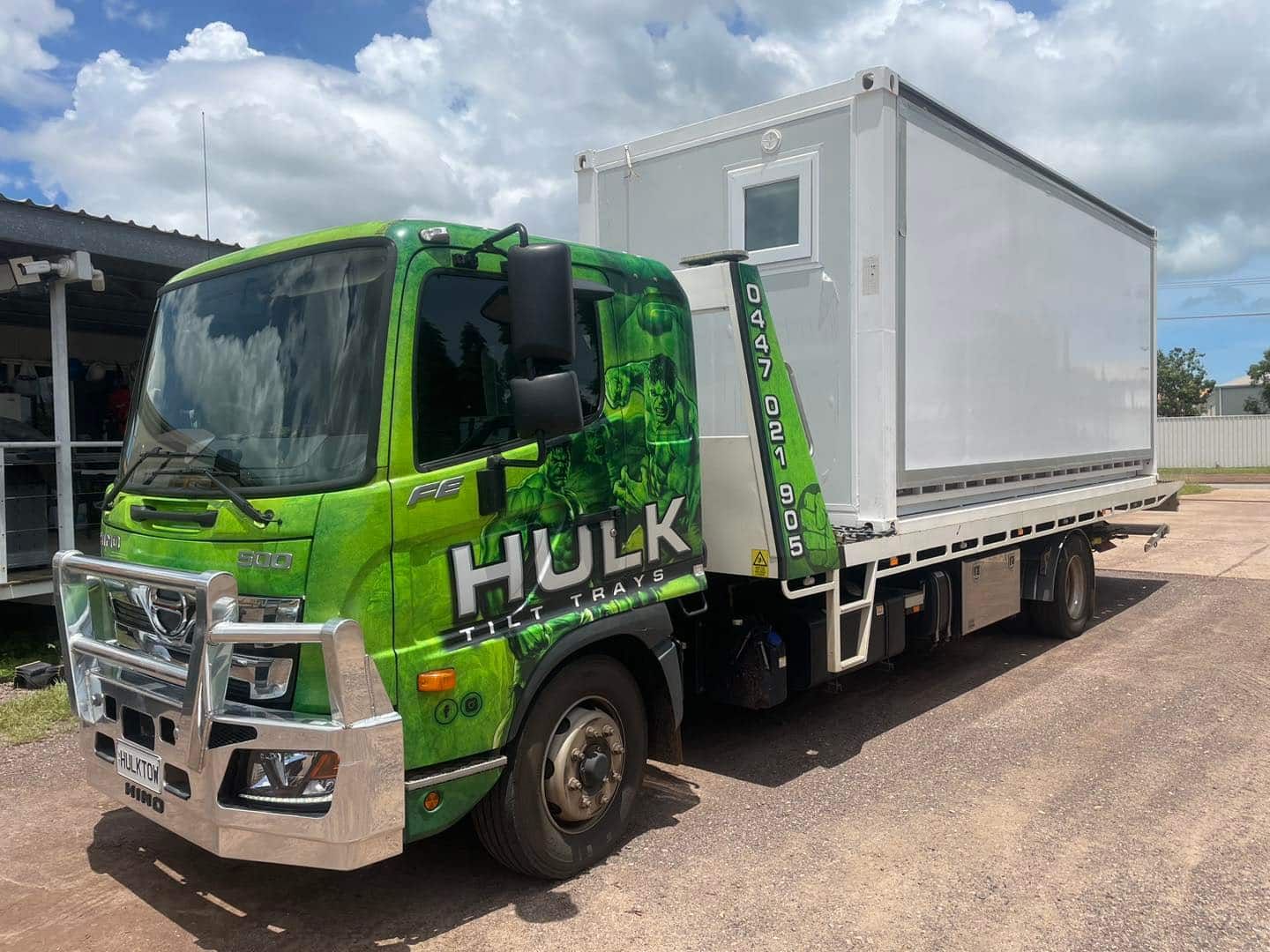A Green and White Truck with The Word Hulk on The Side Is Parked in A Parking Lot — Hulk Tilt Trays In Humpty Doo, NT