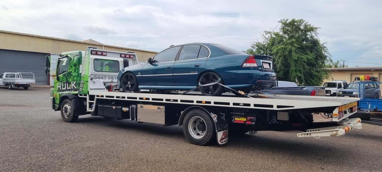 A Blue Car Is Sitting on Top of A Flatbed Tow Truck — Hulk Tilt Trays In Humpty Doo, NT