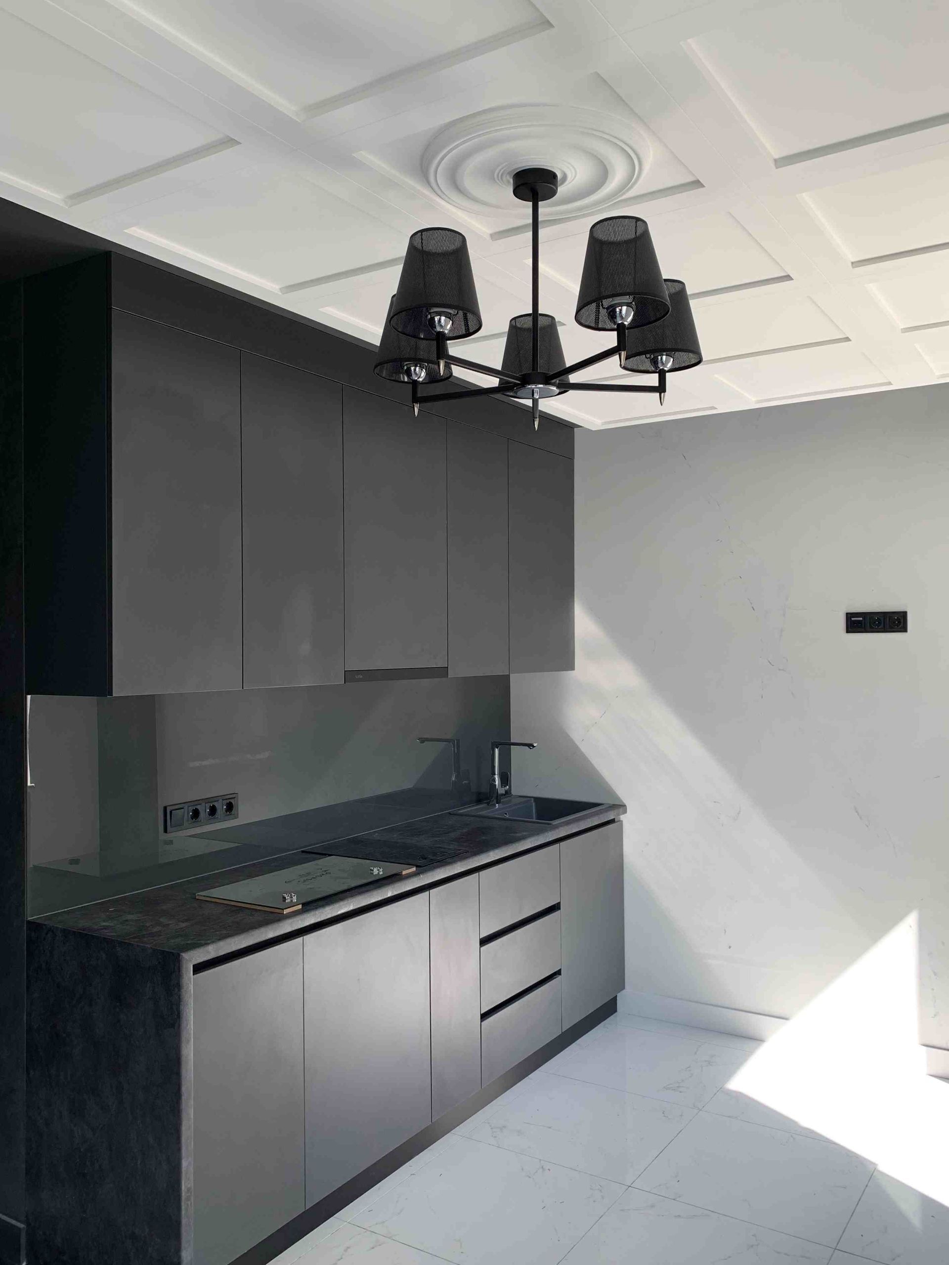 Black cabinetry in a kitchen