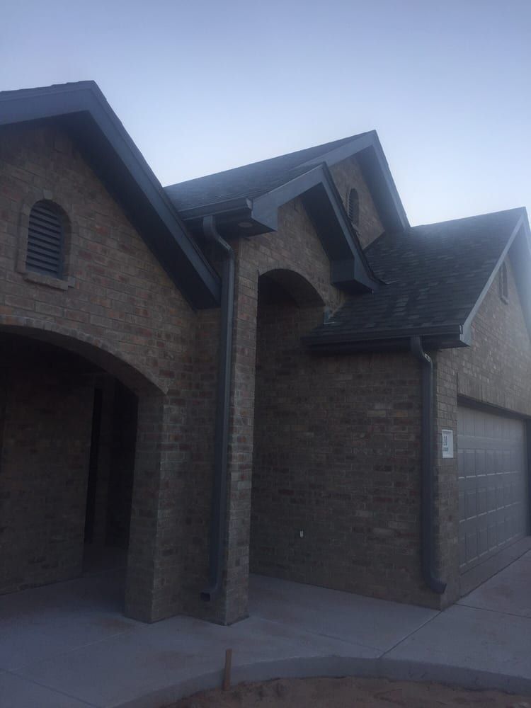 Charcoal Gray Continuous Gutters