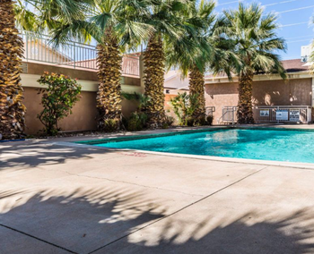 Dixie Cove student housing in St. George offers Utah Tech off-campus housing with spacious private and shared bedrooms. Features in-unit laundry, a pool, hot tub, and social common areas. Ideal off-campus housing in St. George for students