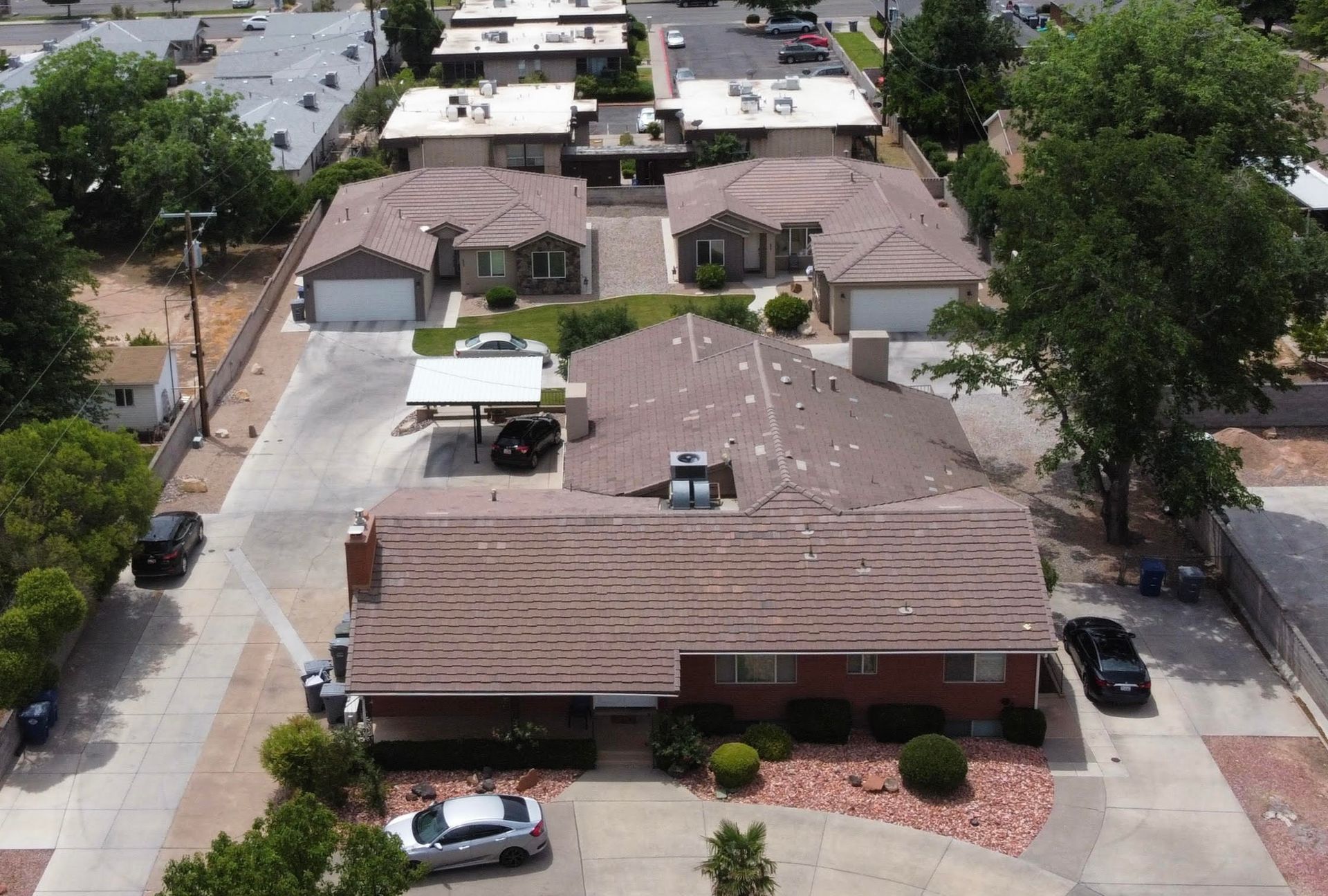650 Complex off-campus housing near Utah Tech with large bedrooms across three houses and five units. Features in-unit laundry, spacious living areas, an outdoor grill, and yard space.