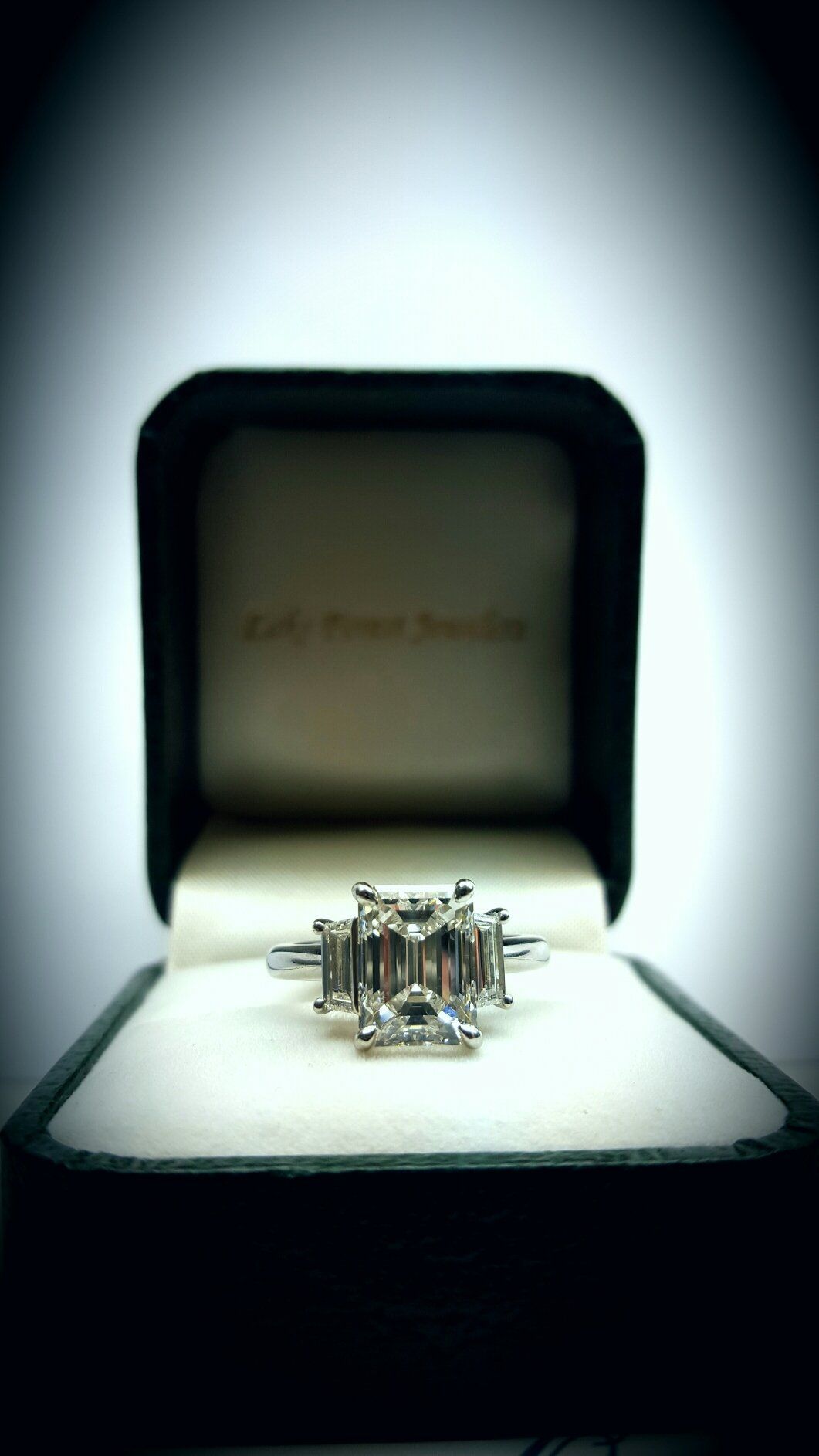 Three Stone Emerald Cut Ring