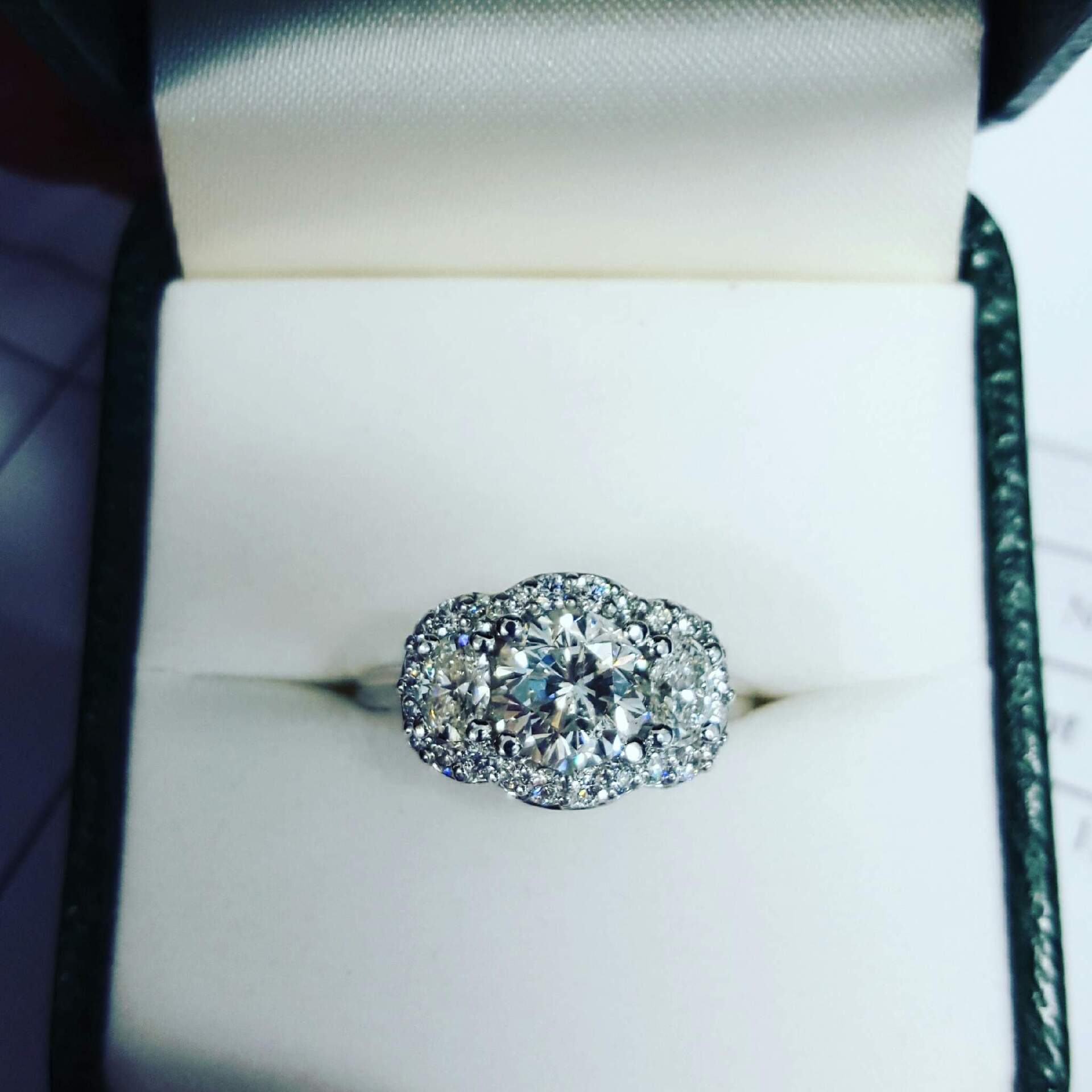 Shared Halo Three Stone Ring
